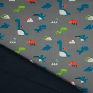 Tela softshell de dinosaurios fondo gris y reverso negro