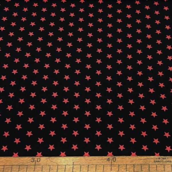 Tela de punto de camiseta de algodón orgánico tipo Jersey estampado estrellas coral fondo negro