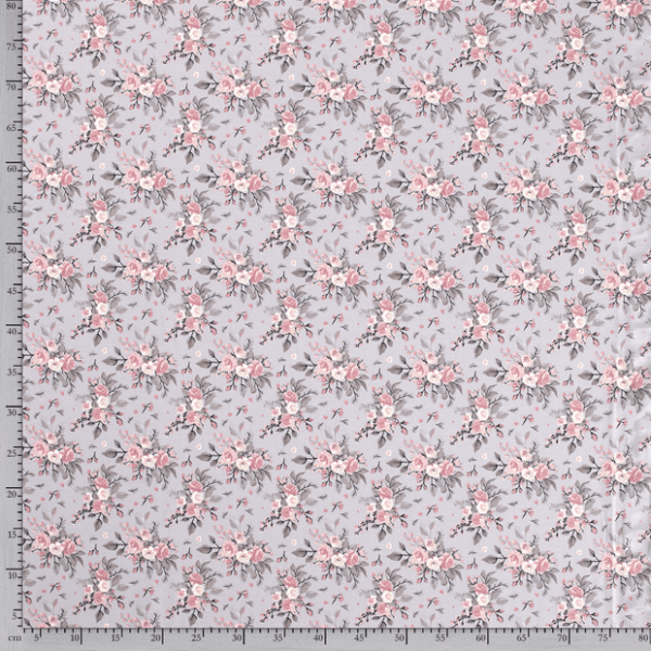 Punto de algodón tipo jersey estampado con ramilletes de rosas fondo gris claro
