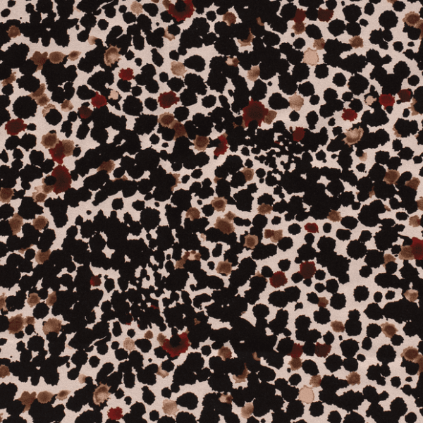 Tejido de viscosa con estampado de manchas de pincel fondo beige