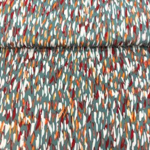 Tejido de viscosa con estampado de pétalos de colores fondo verde