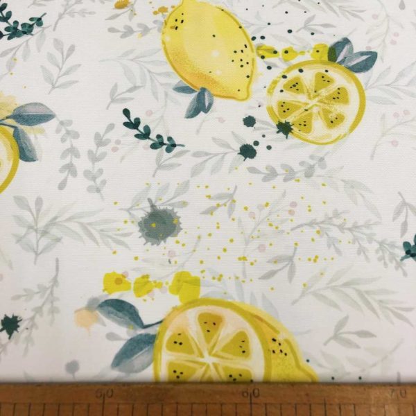 Mantelería antimanchas de poliéster estampado de limones