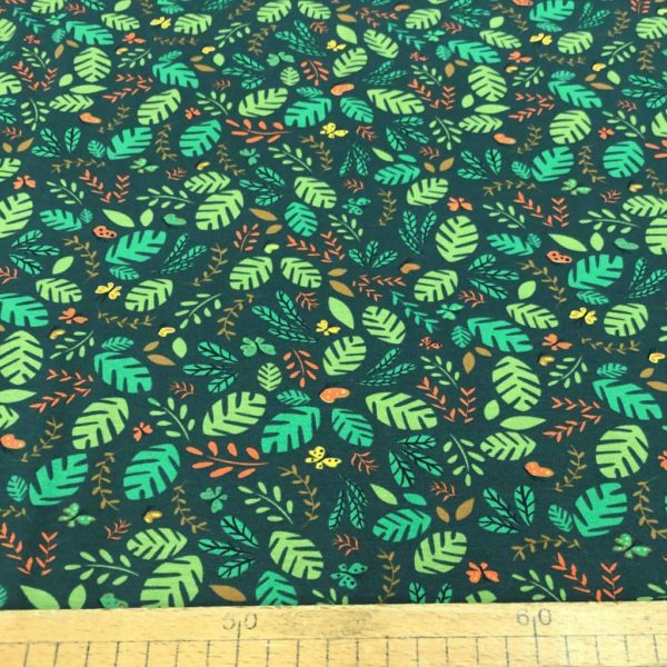 Punto de camiseta de algodón estampada con hojas y mariposas fondo verde