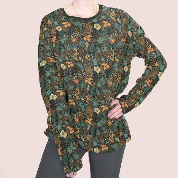Punto de camiseta de algodón estampada tropicana flor ocre fondo verde