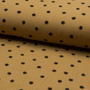 Tela de muselina de algodón 100x100 con dots en negro fondo color ocre