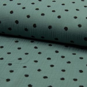 Tela de muselina de algodón 100x100 con dots en negro fondo color dusty green