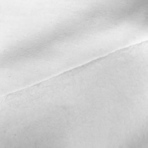 Punto de sudadera de entretiempo tipo french terry suave lisa blanco óptico