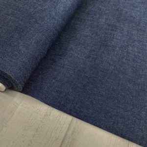 Tela de tejano de verano en algodón en color azul índigo