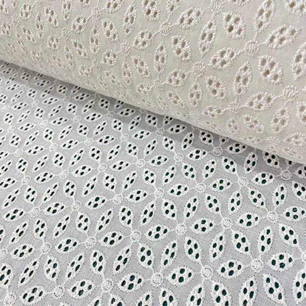 Algodón bordado perforado, tejido fresco, fino y delicado con flores bordados.