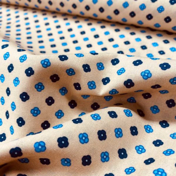 Algodón popelín de algodón 100% para creatividades de patchwork con estampado de florecitas azules fondo beige