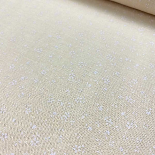 Algodón popelín de algodón 100% para creatividades de patchwork con estampado de florecitas blancas sobre un fondo de color beige