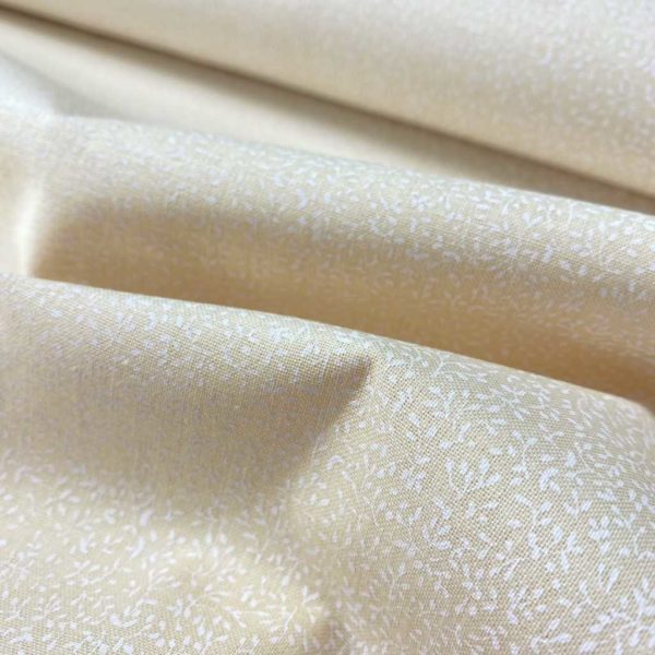 Algodón popelín de algodón 100% para creatividades de patchwork con estampado de ramitas blancas sobre un fondo de color beige