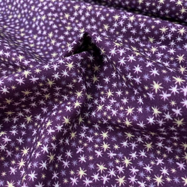 Algodón popelín de algodón 100% para creatividades de patchwork con estampado de asteriscos de colores fondo lila