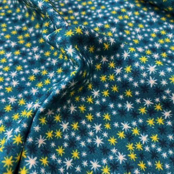 Algodón popelín de algodón 100% para creatividades de patchwork con estampado de asteriscos de colores fondo turquesa