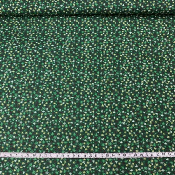 Algodón popelín de algodón 100% para creatividades de patchwork con estampado de asteriscos de colores fondo verde