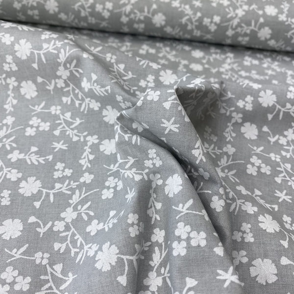 Algodón popelín de algodón 100% para creatividades de patchwork con estampado con clavelitos blancos fondo gris