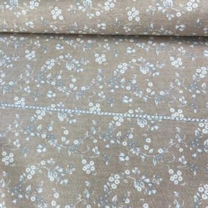 Loneta estampada de 2,80 m de ancho ramilletes blancos fondo taupé