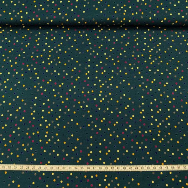 Tejido de viscosa elástica estampada de topitos fondo verde