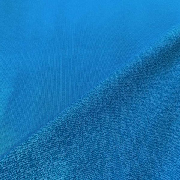 Punto de sudadera de verano tipo French Terry lisa color azul cyan