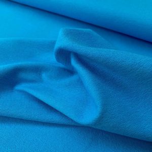 Punto de sudadera de verano tipo French Terry lisa color azul cyan