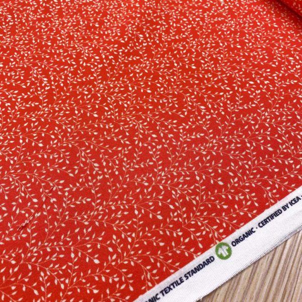 Algodón popelín de algodón 100% para creatividades de patchwork con estampado de ramas en tono rojo coral