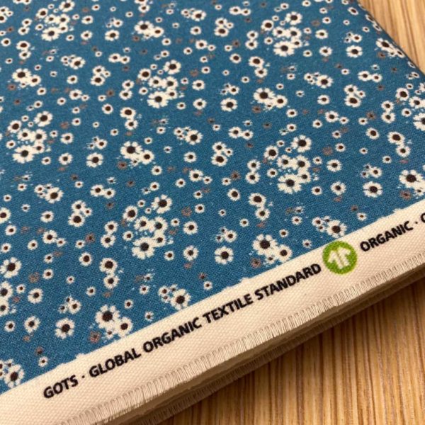 AlgAlgodón popelín de algodón 100% para creatividades de patchwork con estampado con flores pequeñas blancas fondo azul