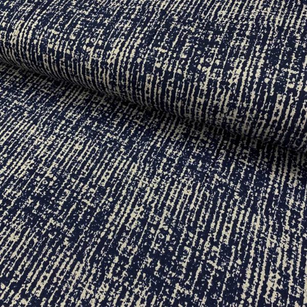 Tejido de viscosa elástica estampada con grabado azul marino fondo crudo