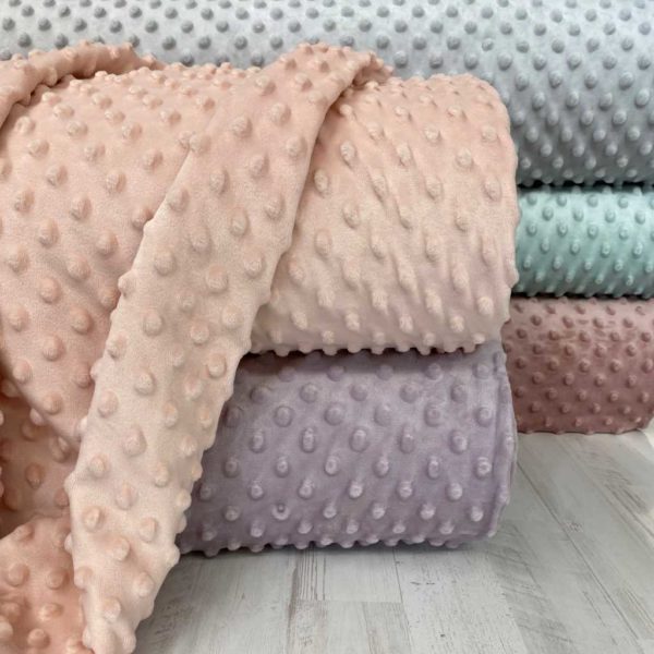 Minky tonos pastel para confecciones de invierno con moteado en relieve