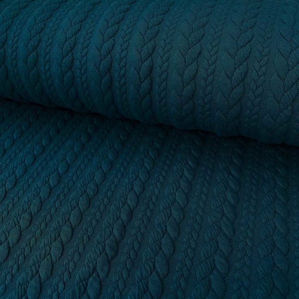Jersey de punto con patrón trenzado tipo Jacquard. Suave y agradable. Color petrol