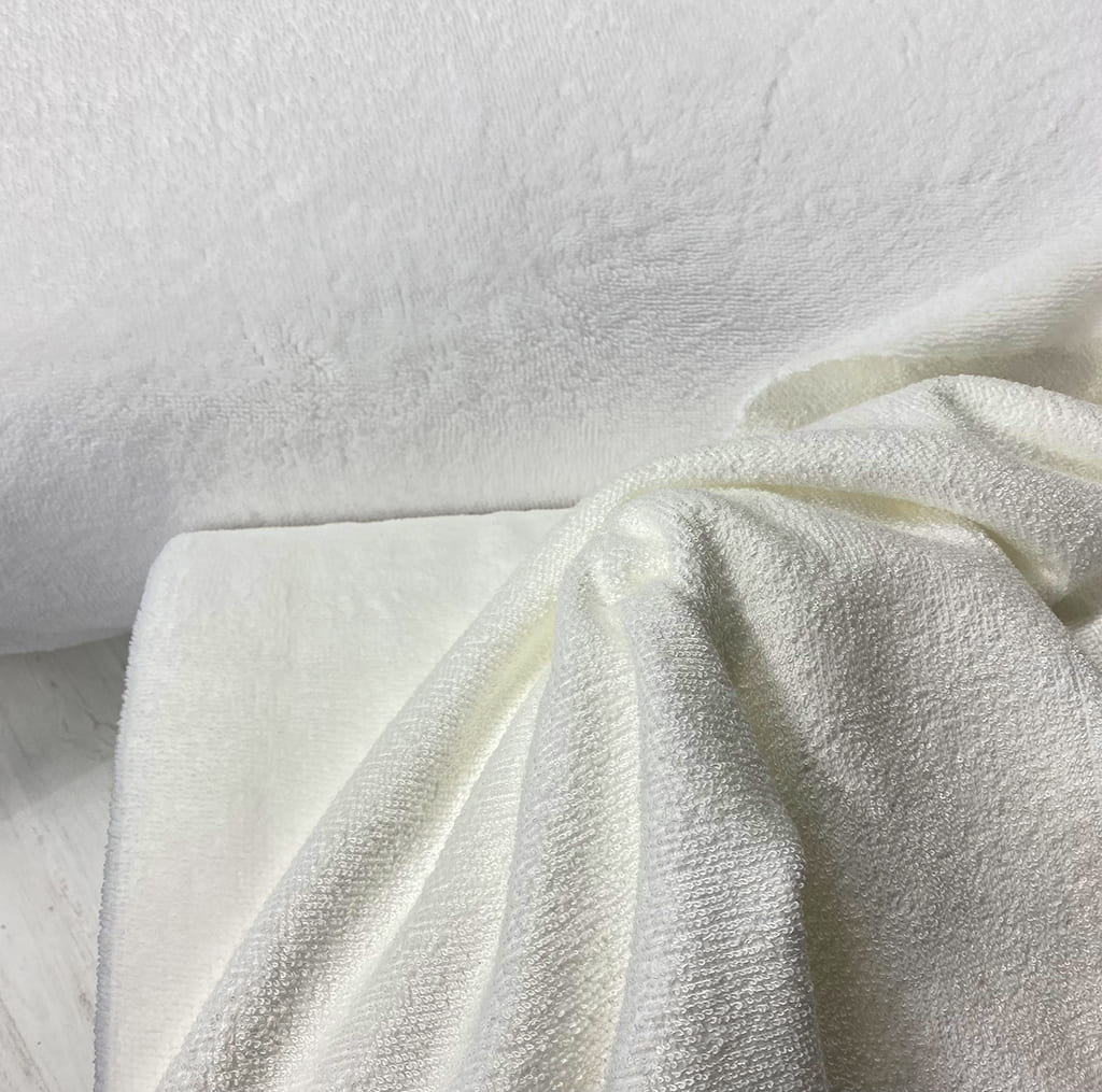 Velour con toalla rizo de BAMBÚ por una cara velour suave y por otra la toalla de rizo de bambú