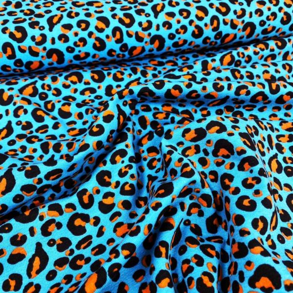 Tela de punto de camiseta de algodón orgánico tipo Jersey estampado animal print turquesa puntos teja