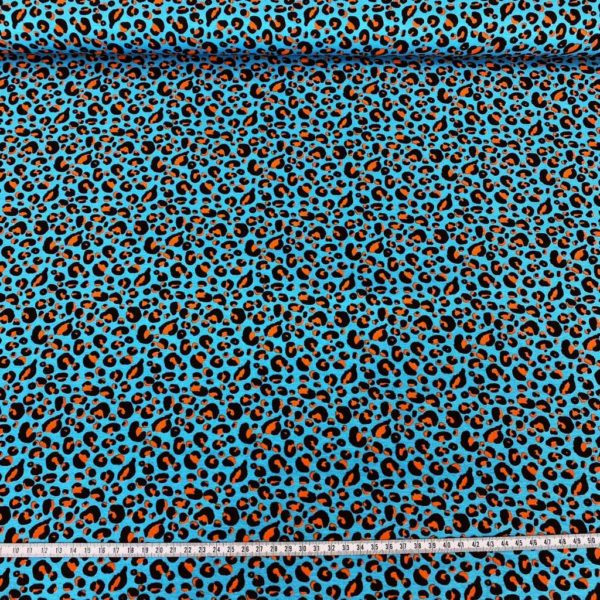 Tela de punto de camiseta de algodón orgánico tipo Jersey estampado animal print turquesa puntos teja