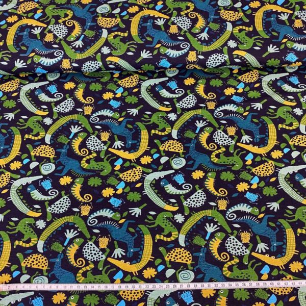 Tela de punto de camiseta de algodón orgánico tipo Jersey estampado con animales de la selva fondo azul navy