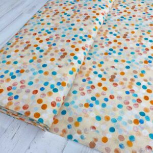 Algodón popelín de algodón 100% ORGÁNICO para creatividades de patchwork con estampado tipo redondas de confeti de colores fondo ocre