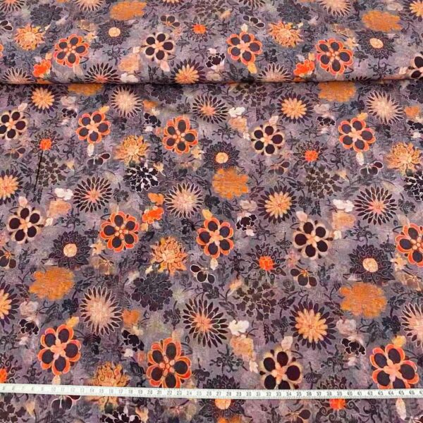 Tela de vestir de viscosa 100% estampado con flores grandes en tonos lilas y naranjas