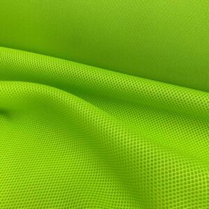 La malla 3D es un tejido transpirables, que no retiene el agua y es de secado rápido. Color verde flúor.
