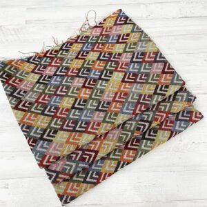 Tela de tapicería gobelino estampado con rombos en forma de flecha