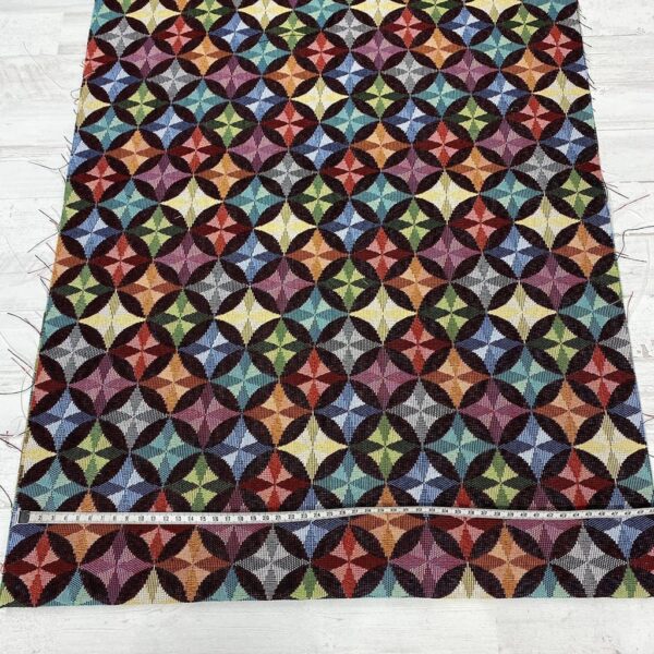 Tela de tapicería gobelino estampado con rosetón estrella en tonos tierra