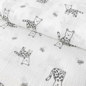 Tela de muselina o tela de doble gasa, algodón 100x100. Tejido con estampado infantil con jauar fondo blanco.