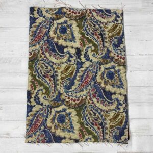 Retal de tela de tapicería gobelino estampado de cachemira en color azul.