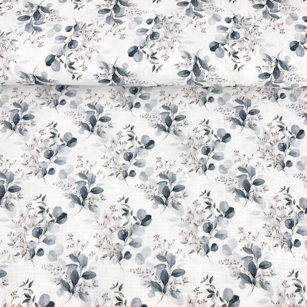 Tela de muselina o tela de doble gasa, algodón 100x100. Tejido con estampado digital con flores de primavera fondo blanco.