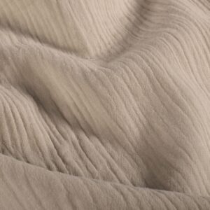 Tela de muselina o doble gasa de algodón beige. Tejido de algodón muy suave y ligero. Textura rugosa y transiprable. Ideal para confecciones del hogar o infantiles.
