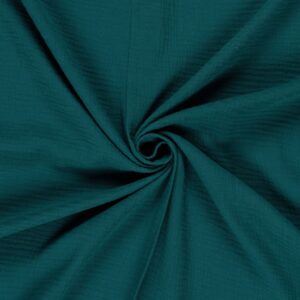 Tela de muselina o doble gasa de algodón petrol. Tejido de algodón muy suave y ligero. Textura rugosa y transiprable. Ideal para confecciones del hogar o infantiles.