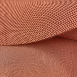 La malla 3D es un tejido transpirables, que no retiene el agua y es de secado rápido. Color teja.