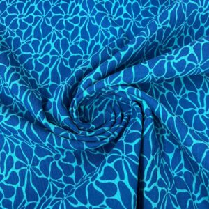 Fondo de tela con patrón floral en tonos azules.