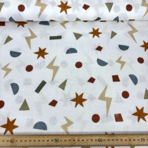 Muselina de algodón con estampado de estrellas y formas geométricas en colores tierra.