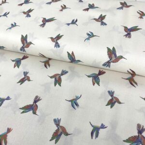 Papel de algodón con diseño de colibríes en tonos vibrantes, ideal para manualidades y proyectos cre.