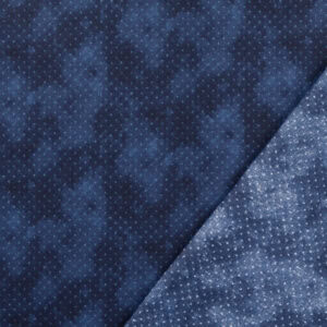 Tecido de terciopelo azul con detalles brillantes y textura suave.