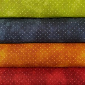 Tejidos de algodón con puntos en colores verde, azul, naranja y rojo para costura y manualidades.